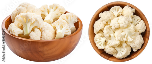 White cauliflower cut in pieces in a wooden bowl, side and top view, isolated on transparent background, vegetable bundle photo