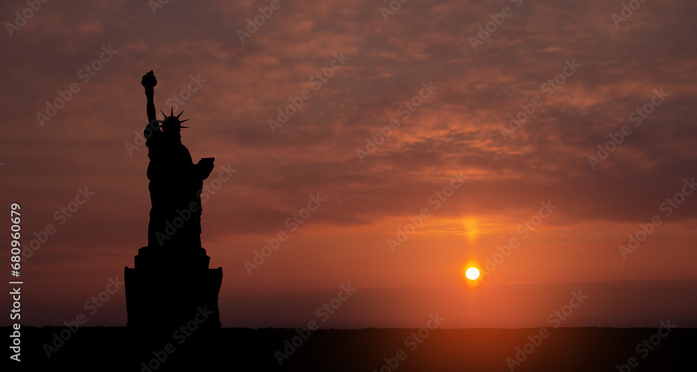 Statue of Liberty on background of sunset sky. Greeting card for Independence Day. USA celebration. Statue of Liberty on background of sunset sky. Greeting card for Independence Day. USA celebration.