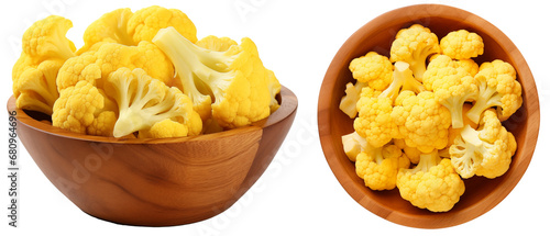 Yellow cauliflower cut in pieces, isolated on a white background, top and side view, food bundle