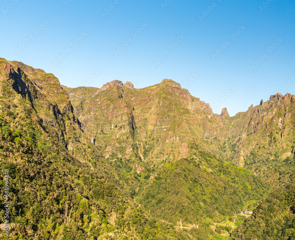 Green and rocky mountains of Madeira - vuew from famous Baleoec viewpoint