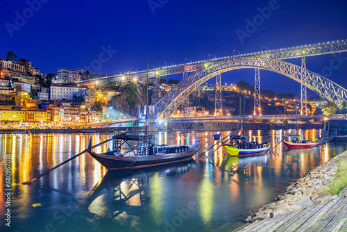 Porto, Portugal old town skyline on the Douro River with Rabelo Boats
