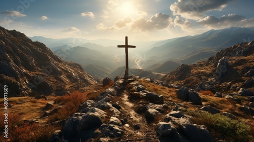 Fotografia A Christian cross on top of a mountain with a shinin