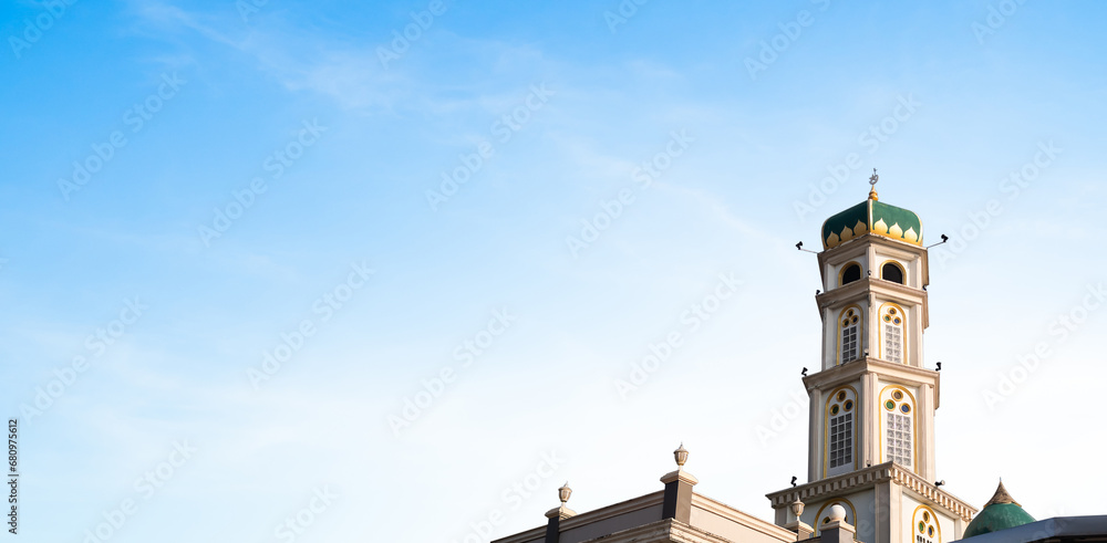 Naklejka premium Mosqur Dome on Blue Sky Background,Ramadan Arab Architecture Islamic Arabic Religion Muslim Islam Holy,Traditional Arabial Mubarak ,New Year Muharram,Eid al-fitr,Arabic Eid Al-adha Kareem Allah.