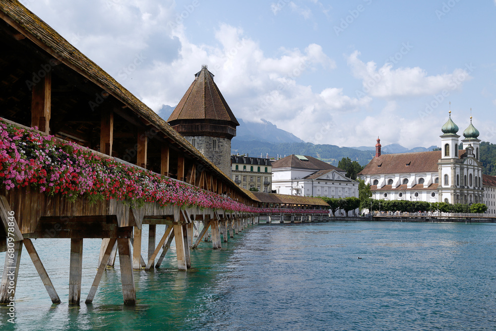View of the Chapel Bridge on river Reuss in historic city of Lucerne, Switzerland View of the Chapel Bridge on river Reuss in historic city of Lucerne, Switzerland
