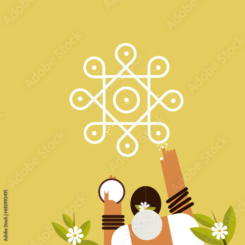 Top view of a traditional Indian woman drawing pattern designs called 'Kolam' on floor