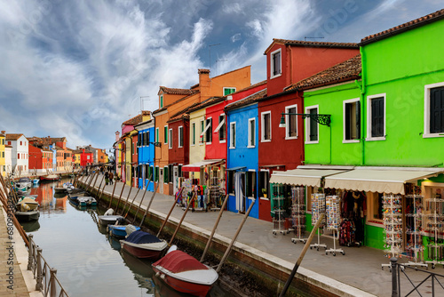 Colorful houses and canal on Burano island, near Venice, Italy. © mstudio