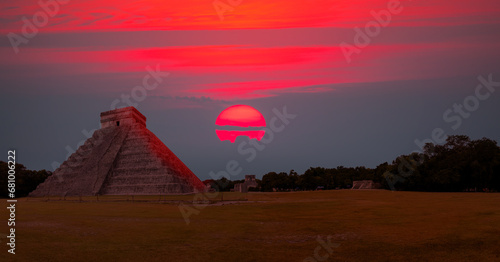 Famous El Castillo pyramid with shadow of serpent at Maya archaeological site of Chichen Itza in Yucatan, Mexico