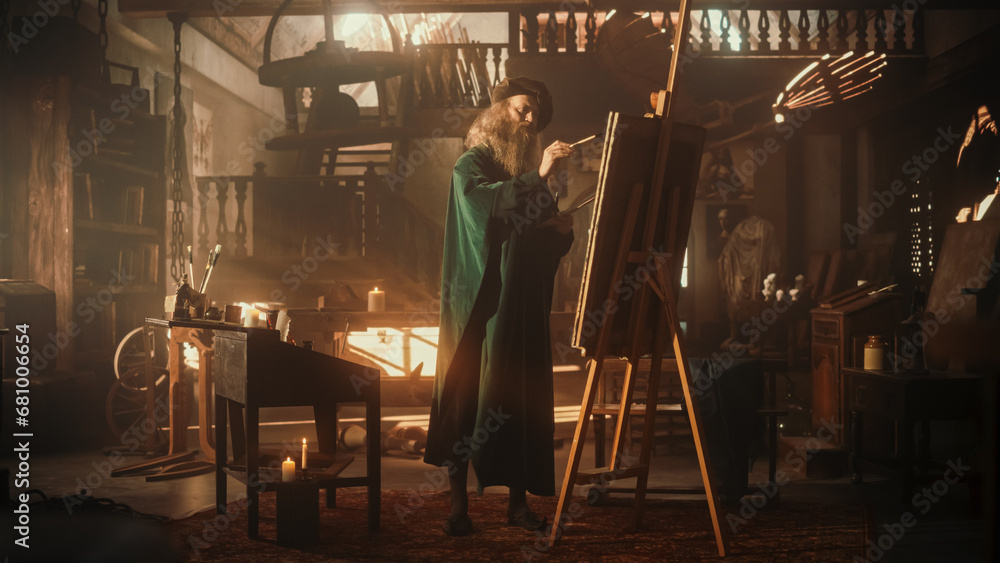 Wide Shot of Old Male Renaissance Artist Painting on Canvas in his Antique Workshop. Talented Historical Figure Working on his Next Masterpiece and Feeling Inspired While Transfering Ideas on Canvas