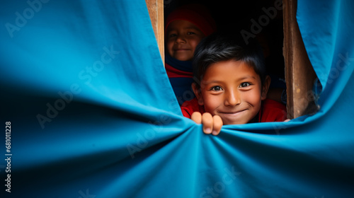 Children Playing Peekaboo with Curtain in Guatemalan School