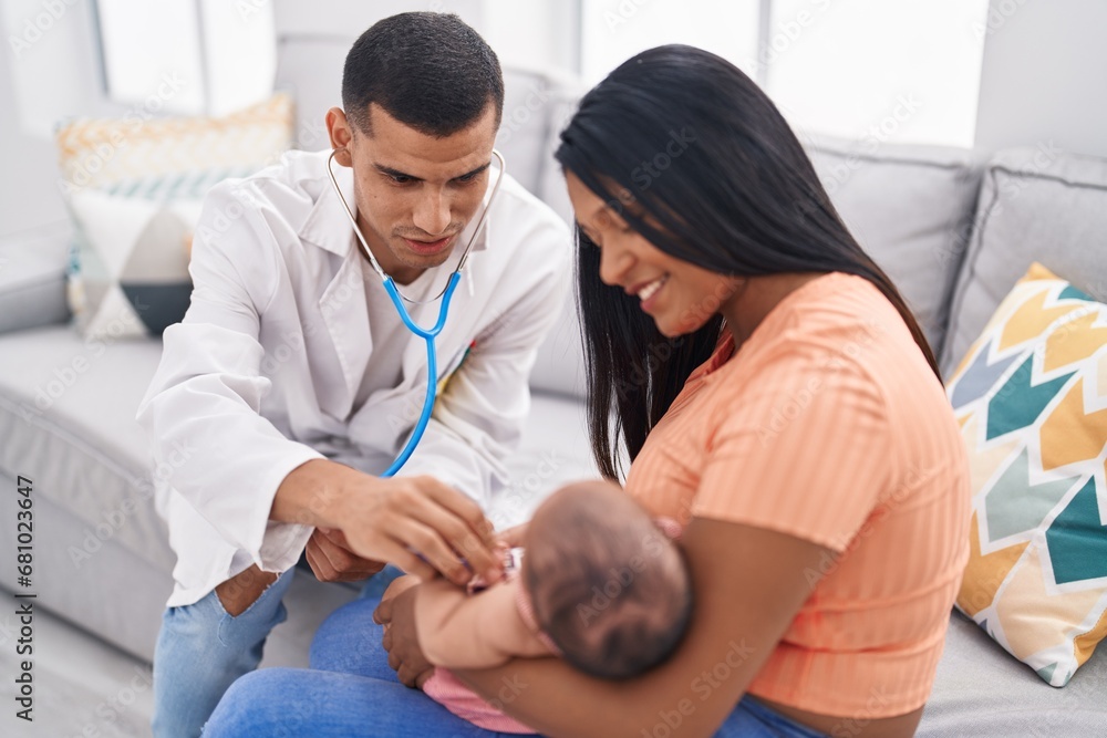 Fototapeta premium Hispanic family having medic consultation auscultating baby at home