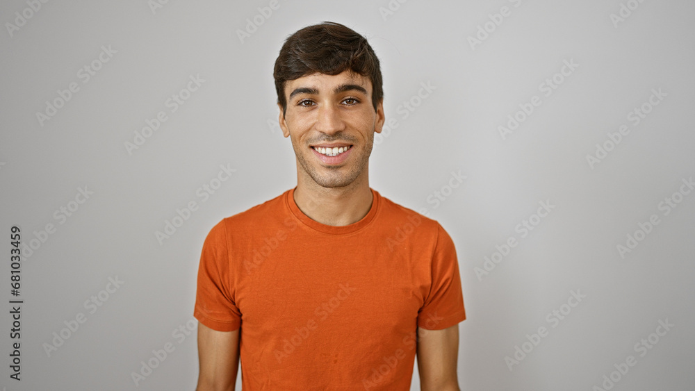 Cheerful young hispanic guy confidently standing, flaunting his attractive smile. this handsome adult man radiates joy, his positive expression stealing the spotlight on isolated white background. Cheerful young hispanic guy confidently standing, flaunting his attractive smile. this handsome adult man radiates joy, his positive expression stealing the spotlight on isolated white background.