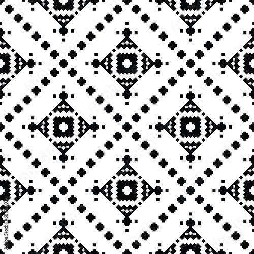 Seamless geometric backdrop with Aztec and Navajo tribal motif. Ethnic contemporary repeat pattern. Black and white colors. Design for fabric, textile, ornament, clothing, background, wrapping, batik.