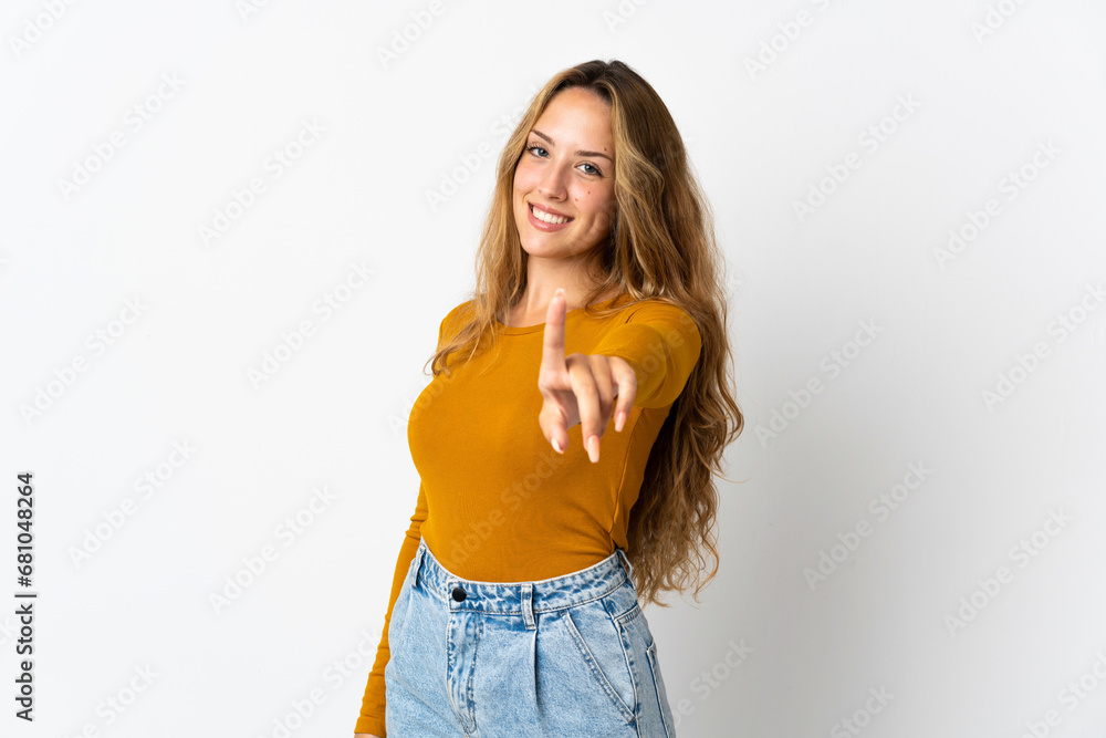 Young blonde woman isolated on blue background showing and lifting a finger Young blonde woman isolated on blue background showing and lifting a finger