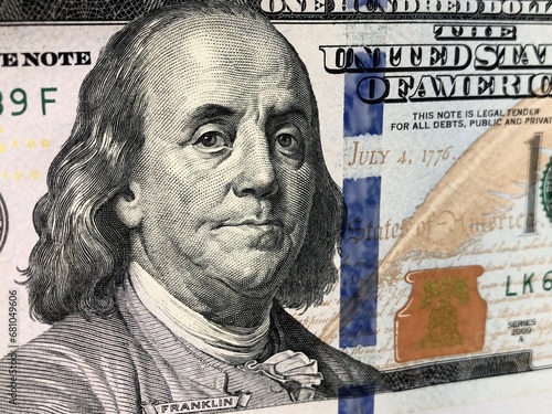 Closeup view of Benjamin Franklin's face on a 100$ bill