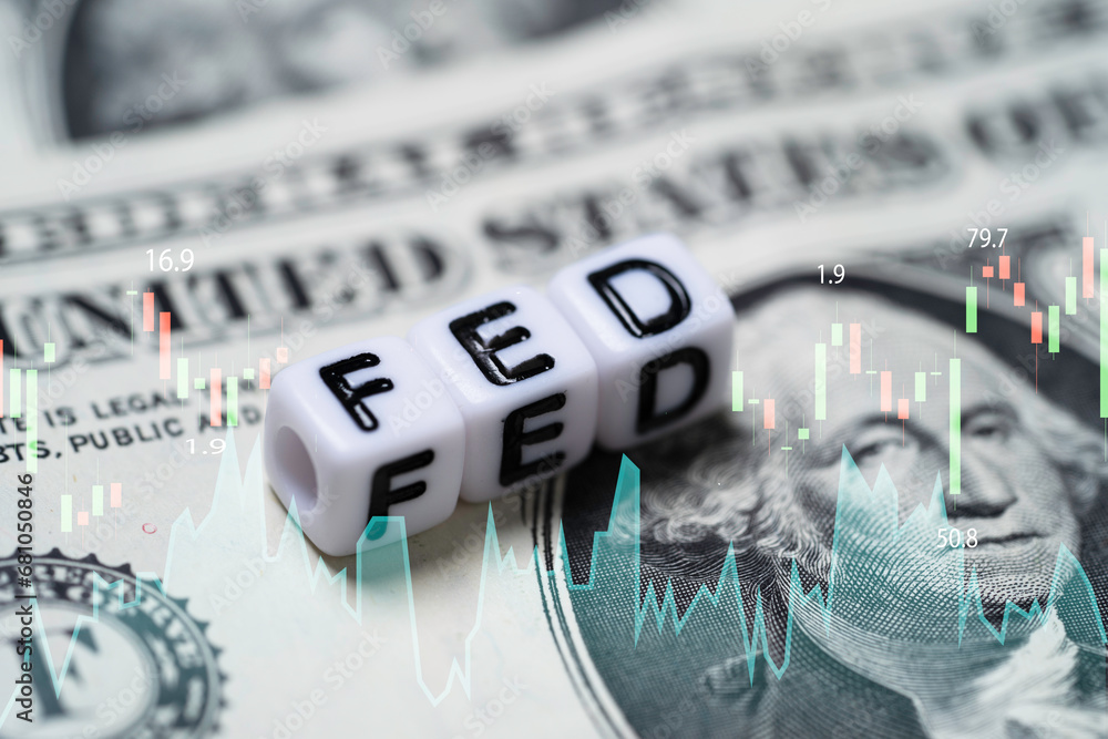 FED Wording With Stock Market Chart On USD Dollar Banknote For Federal fed-wording-with-stock-market-chart-on-usd-dollar-banknote-for-federal
