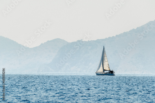 Beautiful seascape with white sailboat