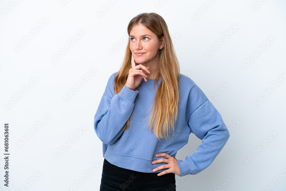 Young blonde woman isolated on white background thinking an idea while looking up Young blonde woman isolated on white background thinking an idea while looking up