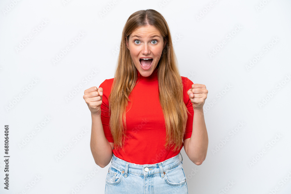 Young caucasian woman isolated on white background celebrating a victory in winner position Young caucasian woman isolated on white background celebrating a victory in winner position