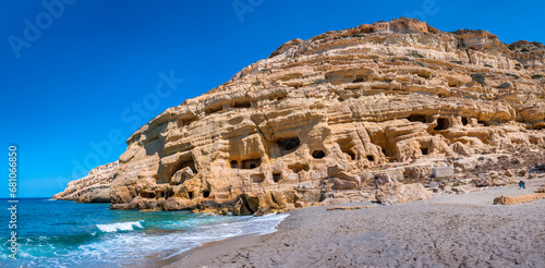 Obraz na płótnie Rocks with caves in which hippies used to live, Matala beach the island of Crete