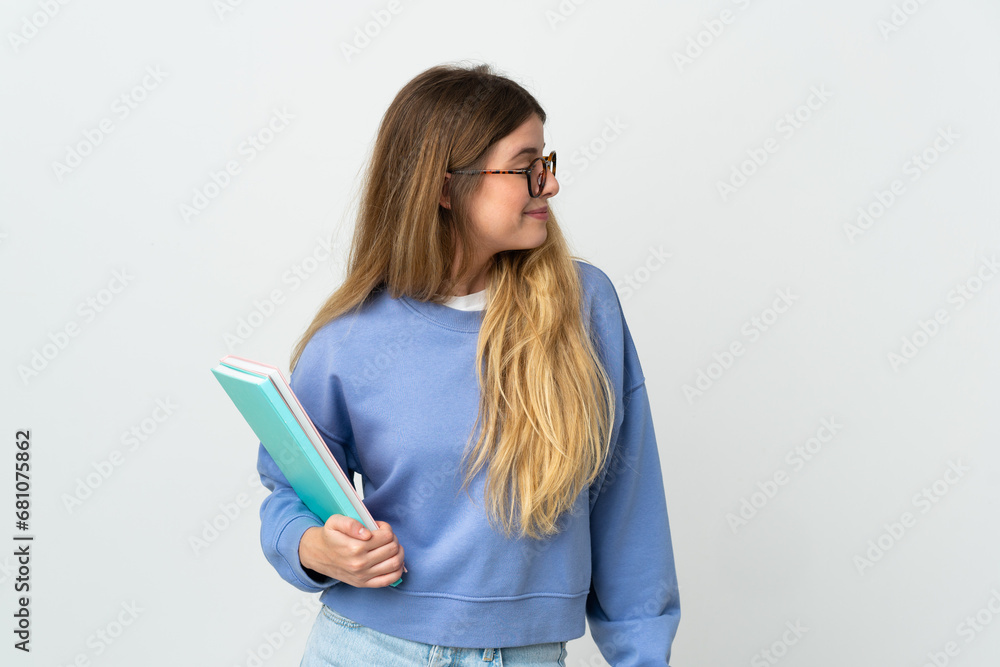 Young blonde student woman isolated on white background . Portrait Young blonde student woman isolated on white background . Portrait