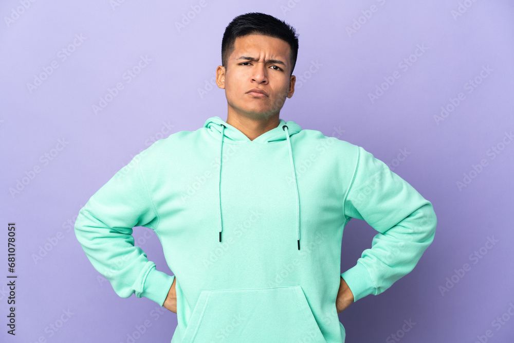 Young Ecuadorian man isolated on purple background angry Young Ecuadorian man isolated on purple background angry