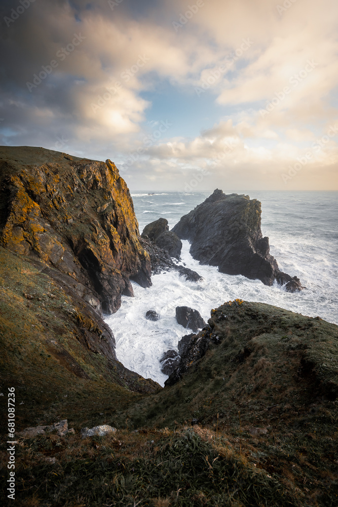 Cliffs and sea at sunset ay Kynance Cove, Cornwall