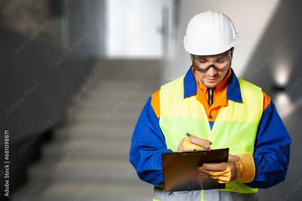 Building inspection young man inspecting home Building inspection young man inspecting home