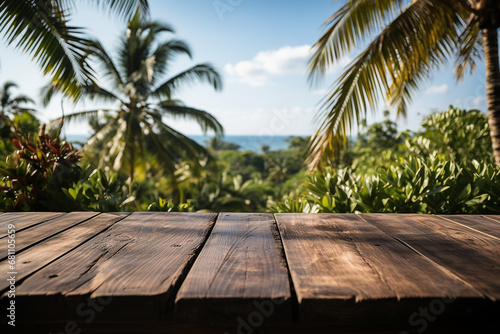 Empty wooden table with palm leaves