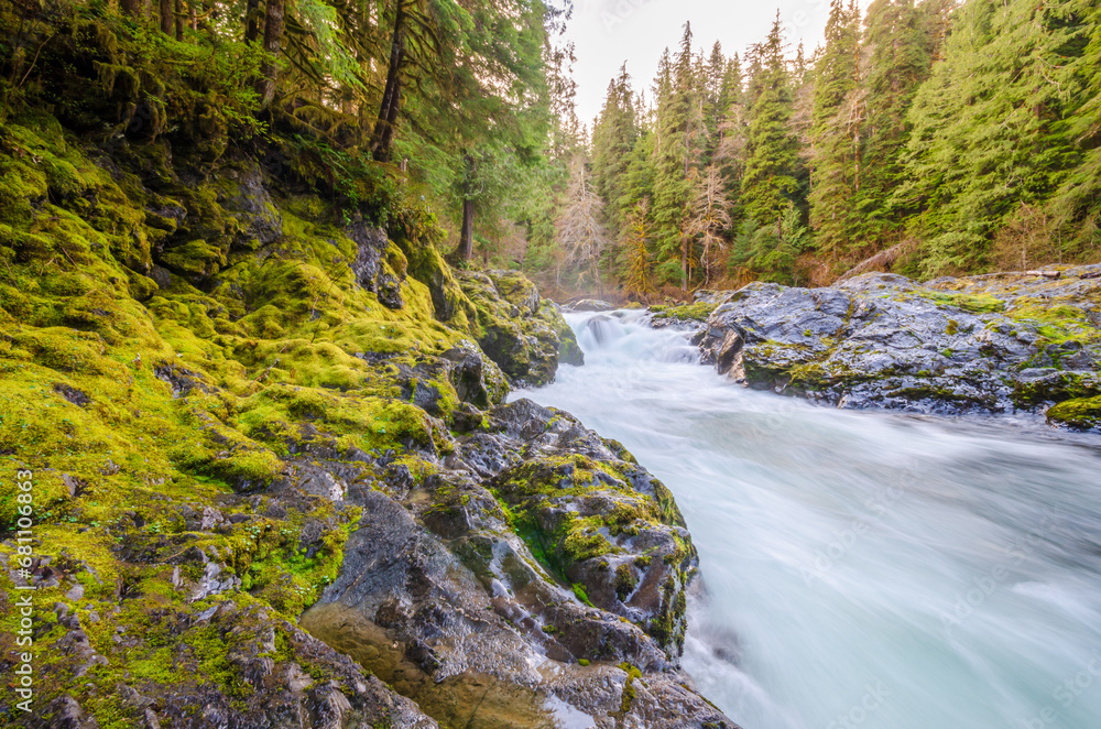Majestic mountain river in slow motion with mountain background in Vancouver, Canada. Majestic mountain river in slow motion with mountain background in Vancouver, Canada.