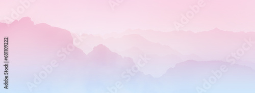Layered mountain silhouettes with pink to blue gradient. Long panoramic wallpaper. © prystai