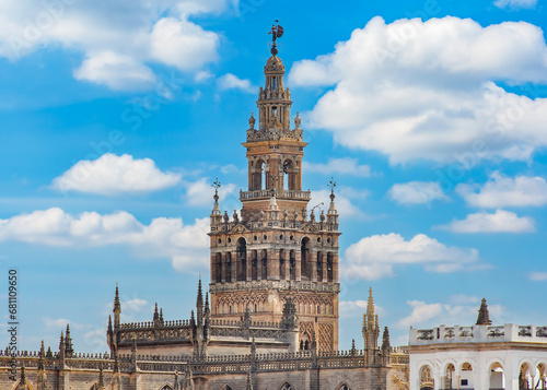 Giralda tower of Seville cathedral, Andalusia, Spain photo