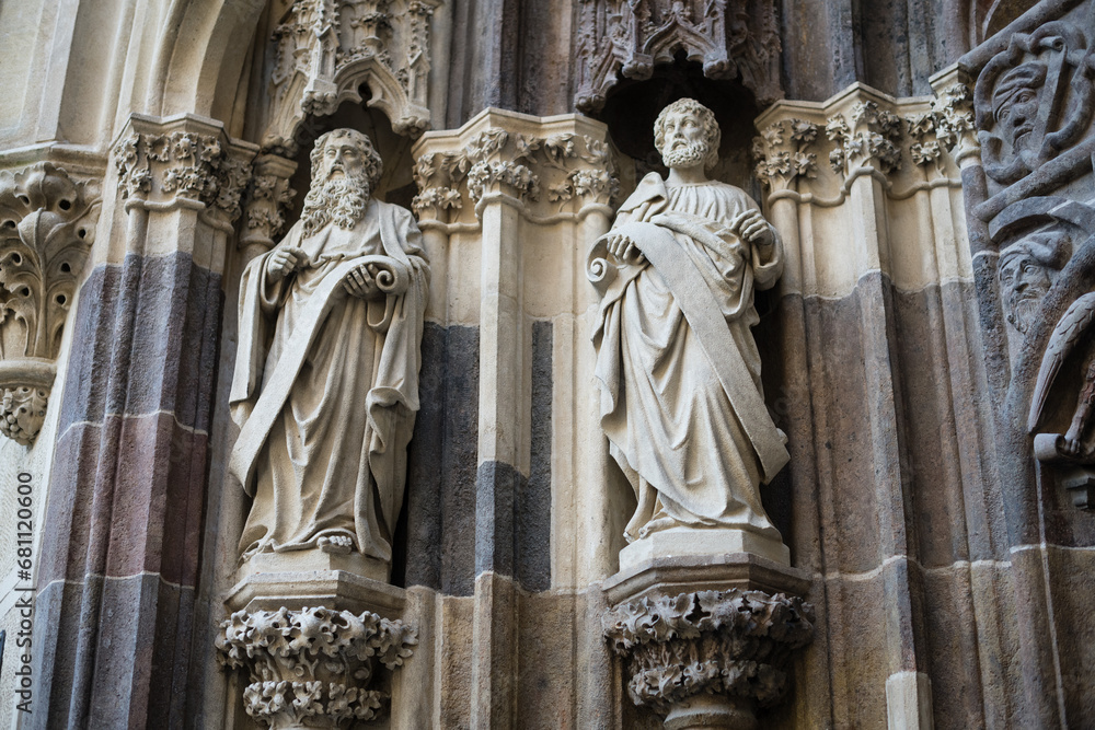 Gothic statues on portal to Basilica Minor of Saint Benedict in Hronsky Benadik, Slovakia