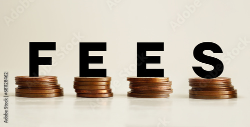 Foto Fees charged are shown using the text and photo of coins