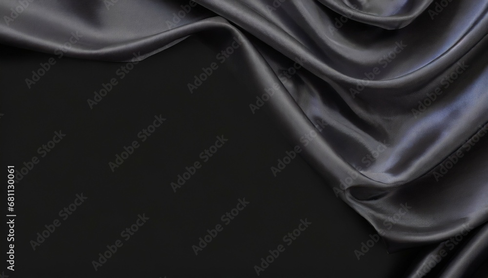 abstract black background black silk satin texture background beautiful soft folds on the fabric black elegant background with copy space for your design