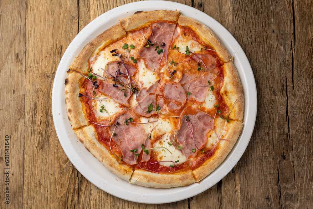 delicious pizza with ham and cheese delicious pizza with ham and cheese