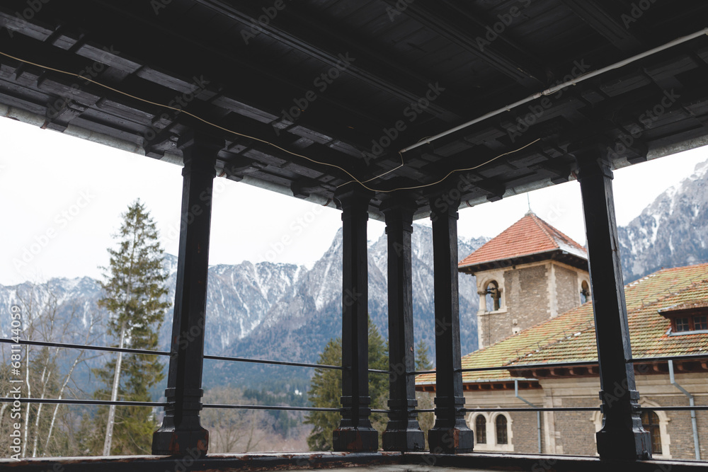 A Majestic Castle Surrounded by Breathtaking Mountains at Peles Castle Sinaia A Majestic Castle Surrounded by Breathtaking Mountains at Peles Castle Sinaia