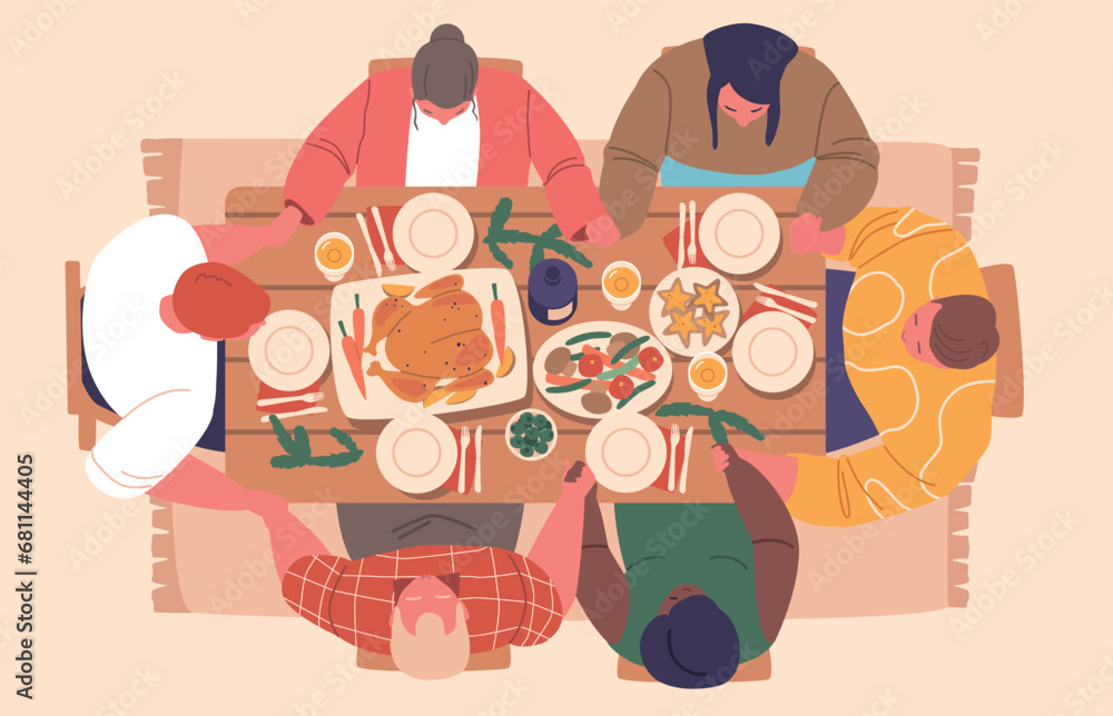 People Gathered Around The Festive Christmas Table Top View, Family or friends Bow In Prayer, Hands Intertwined People Gathered Around The Festive Christmas Table Top View, Family or friends Bow In Prayer, Hands Intertwined