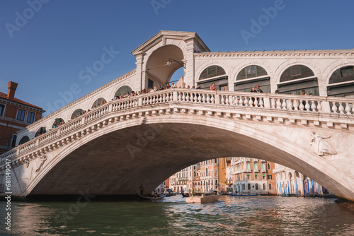 Experience the timeless charm and beauty of Venice with a stunning view of the iconic Rialto Bridge. Capture the elegant arches and intricate design of this historical landmark.