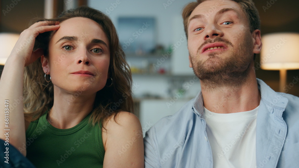 Pov carefree spouses talking together indoors. Relaxed couple discussing movie Pov carefree spouses talking together indoors. Relaxed couple discussing movie