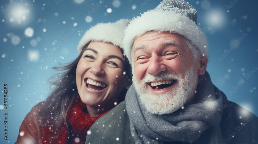 couple in christmas hats against snowy bokeh in winter couple in christmas hats against snowy bokeh in winter