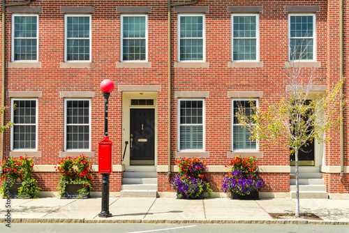 Fotografie Street view of a red brick condo facades in Boston, MA, USA on a sunny summer da