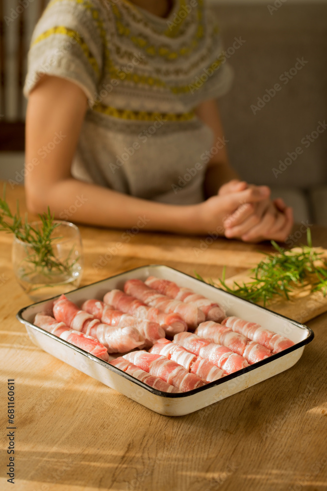 A girl prepares a traditional Christmas dish 