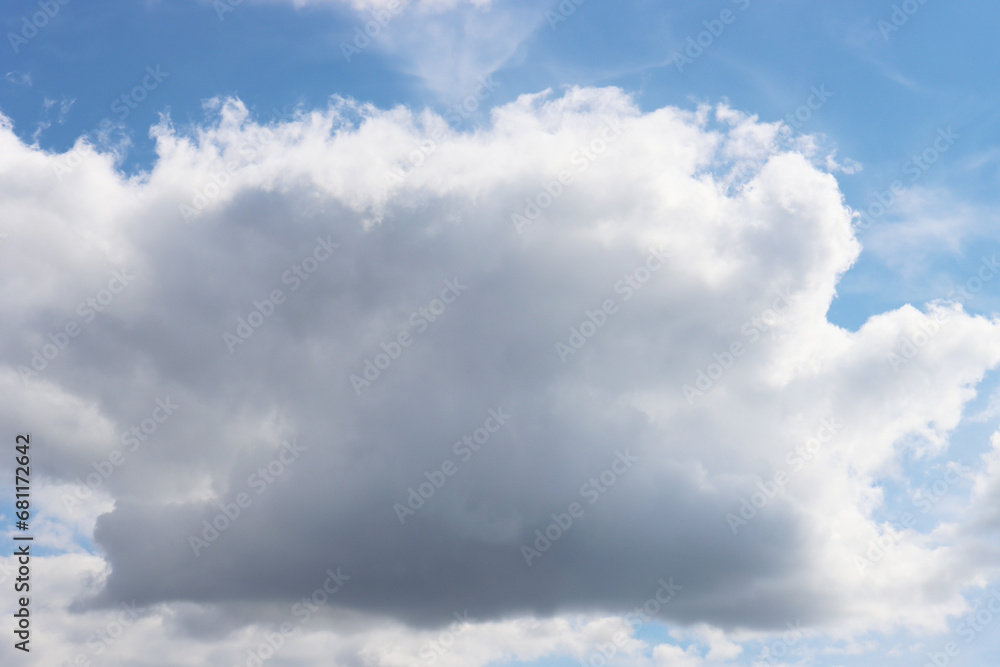 Obraz premium Large thunderclouds on the blue sky.