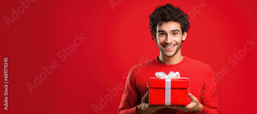 Happy Young Man Holding a  ...