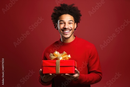 Happy Young Man Holding a  ...