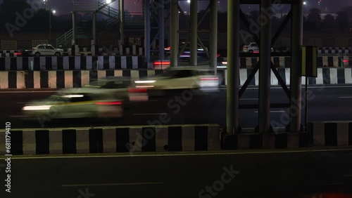 The night view of cars on road with dazzling light, New Delhi photo