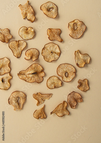 Dried pear slices on a light background. View from above.