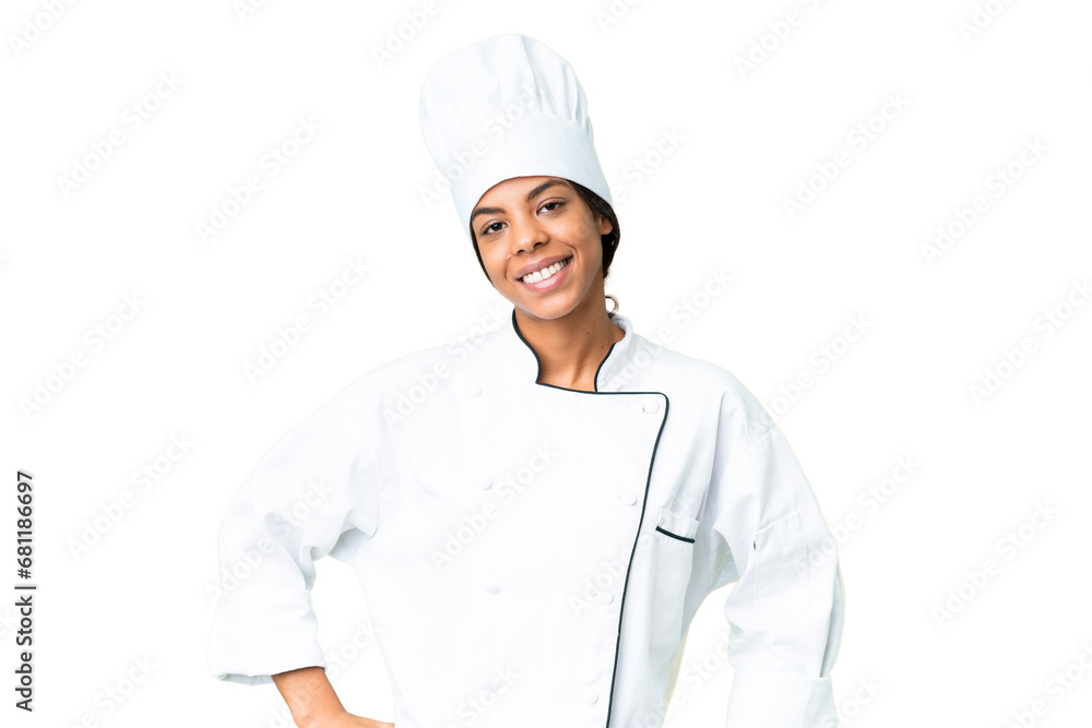 Young African American chef over isolated chroma key background posing with arms at hip and smiling Young African American chef over isolated chroma key background posing with arms at hip and smiling