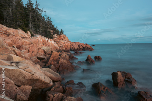 Maine coastline with rocky shoreline and trees
