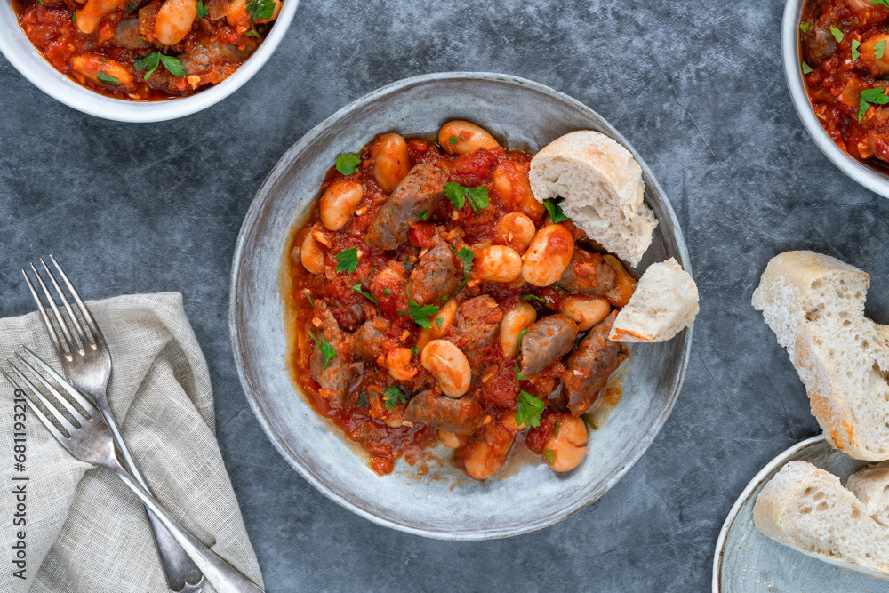 Beef chipolatas and bean casserole with crusty bread Beef chipolatas and bean casserole with crusty bread